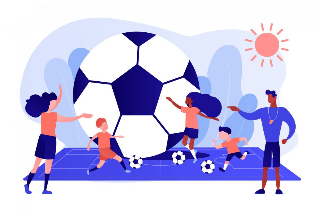 Crianças aprendem a jogar futebol